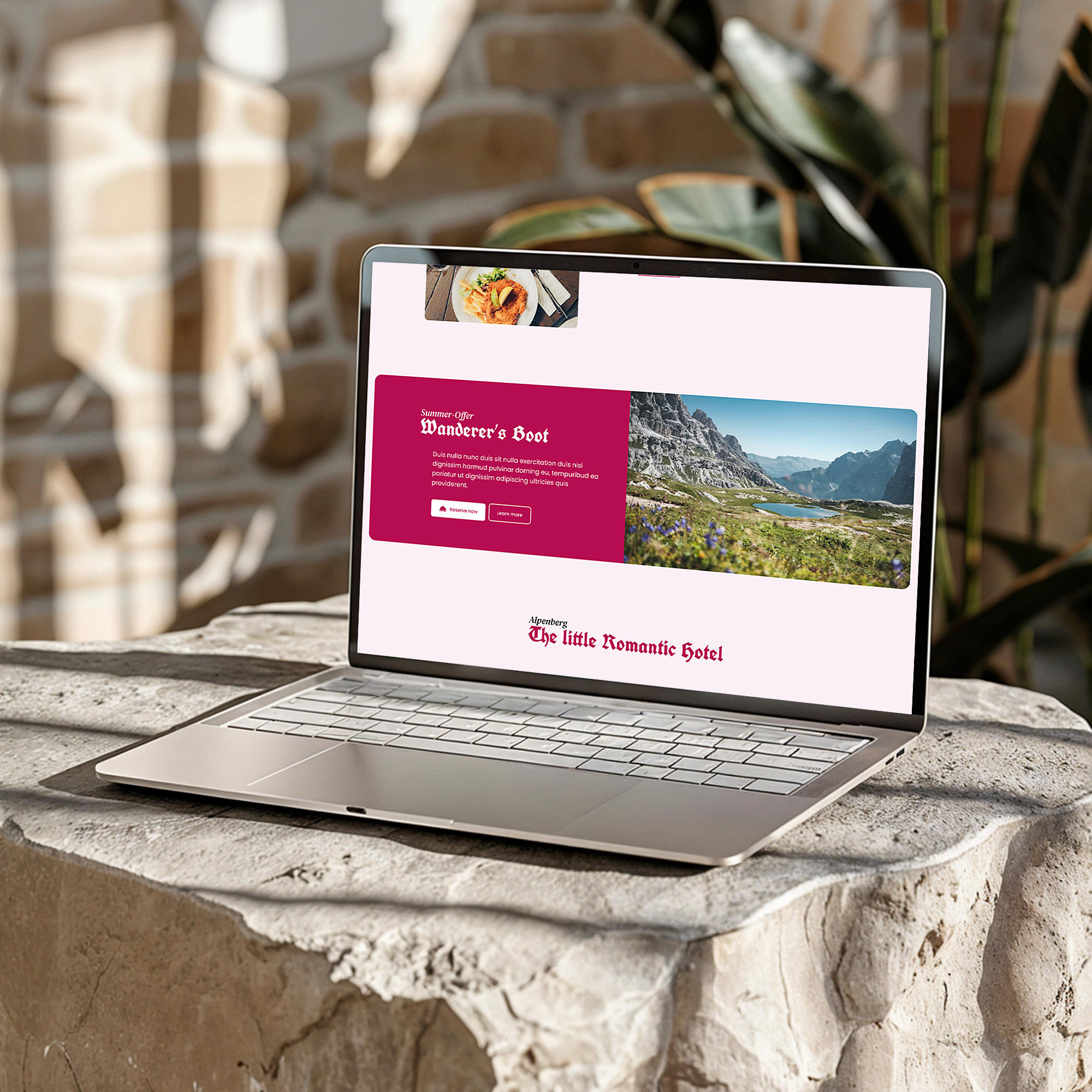 A Notebook which displays the website of Hotel Alpenberg